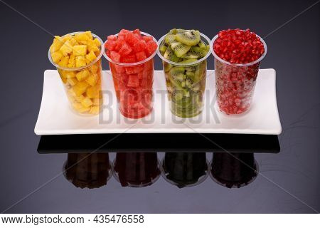Watermelon , Pineapple  , Pomegrenate And Kiwi