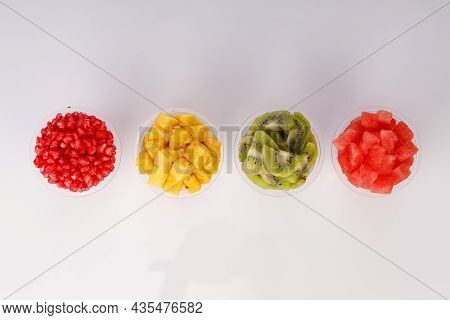 Watermelon , Pineapple  , Pomegrenate And Kiwi