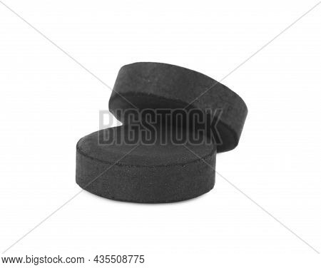 Activated Charcoal Pills On White Background. Potent Sorbent