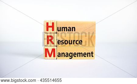Hrm, Human Resource Management Symbol. Words Hrm, Human Resource Management Symbol On Blocks On A Be