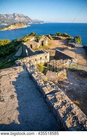 Ruins Of Medieval Fortress Tvrdava Mogren At The Shore Of Adriatic Sea, Montenegro.