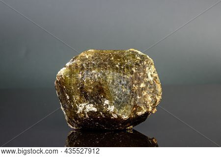 Macro Mineral Stone Andradite On A Black Background Close-up
