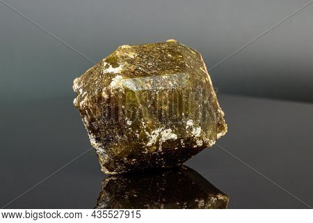 Macro Mineral Stone Andradite On A Black Background Close-up