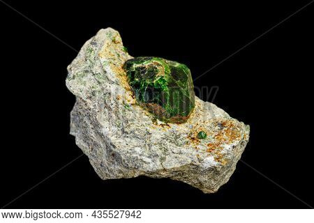 Macro Mineral Stone Andradite On A Black Background Close-up