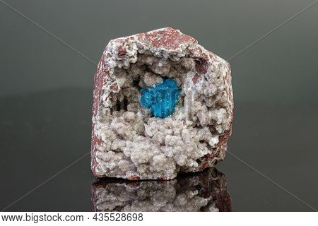 Macro Mineral Stone Cavansite On A Gray Background Close-up