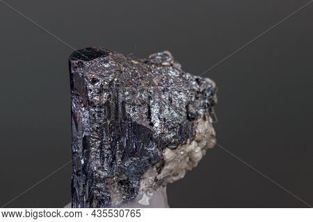 Macro Mineral Acanthite Stone On A Black Background Close-up