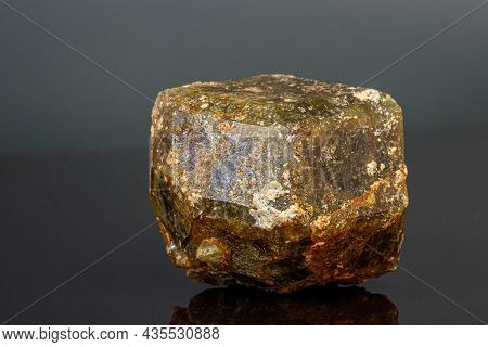 Macro Mineral Stone Andradite On A Black Background Close-up