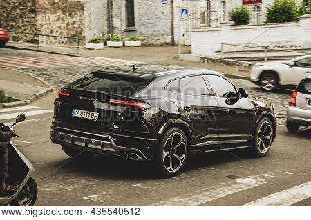 Kiev, Ukraine - June 12, 2021: Black Luxury Super Suv Lamborghini Urus In Motion. Lamborghini Urus S
