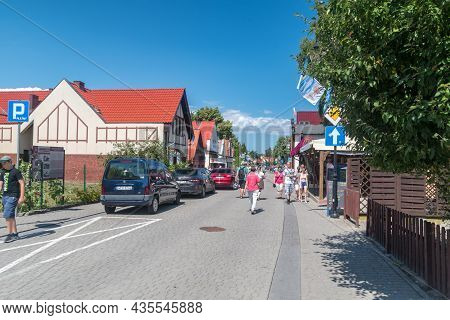 Hel, Poland - July 20, 2021: Pedestrian Street With Tourist In City Center Of Hel On Hel Peninsula.