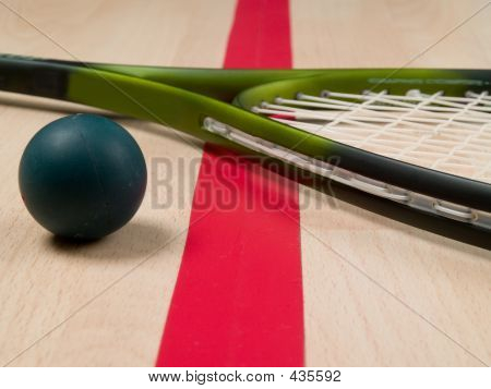 Raquete de squash