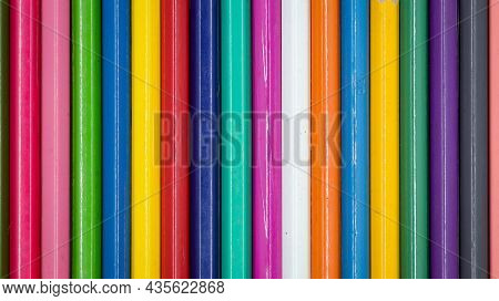 Horizontal Shot Of Different Colors Of Color Pencil Bodies Arranged One After Another Sideways