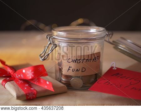 Christmas Savings Fund In Glass Jar To Buy Gifts