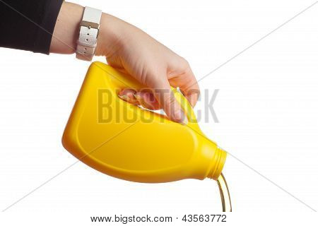 Flow out of the softener in hand on white