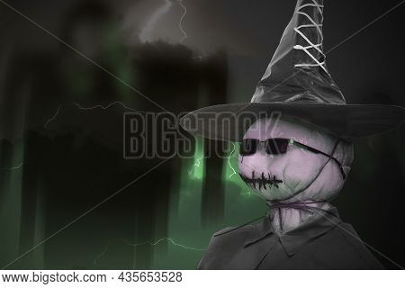 Scarecrow Wearing Witch Hat With Shadow Of Devil In Dark Sky And Lightning In Background.