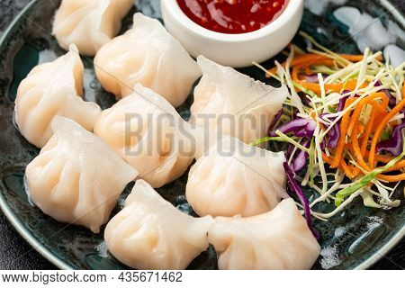 Traditional Asian Prawn Or Shrimp Dumplings Hakau, Ha Kauw Or Har Gow. Served With Cabbage, Carrot S