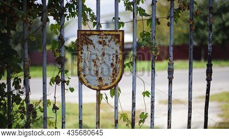 Old Rusty Iron Gate With A Deadbolt. Old Rusty Iron. Rusty Grungy Old Metal Texture For Use As A Bac