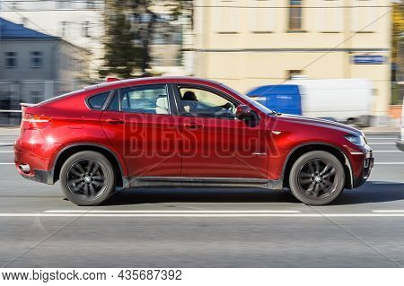 Bmw X6 First Generation E71, Car Driving In City With Motion Blur, View From The Side. Moscow, Russi