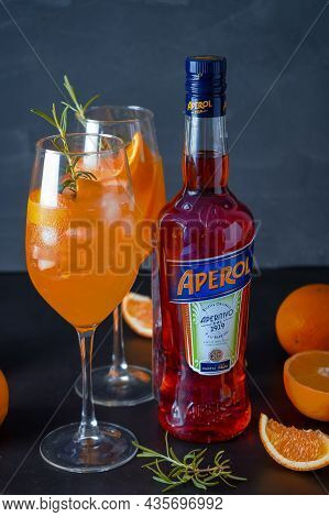 Italian Tincture Aperol For Making Cocktail Aperol Spitz. Red-orange Wine In A Bottle. Alcoholic Dri