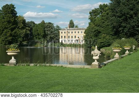 Palace In Kew Gardens And The Fountain Pool