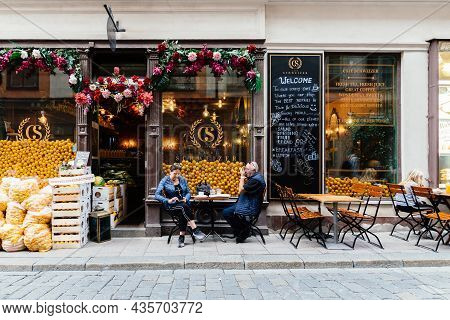 Stockholm, Sweden - August 9, 2019: People Sitting On A Table In Schweizer Konditori Cafe In Gamla S