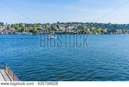 View Of Buildings Along Lake Union. Shot Taken From Gasworks Park In Seattle, Washington.