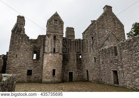 Ancient Courtyard Of Tolquhon Castle In Tarves, Ellon, Scotland, Uk In Cloudy Weather With Grey Sky