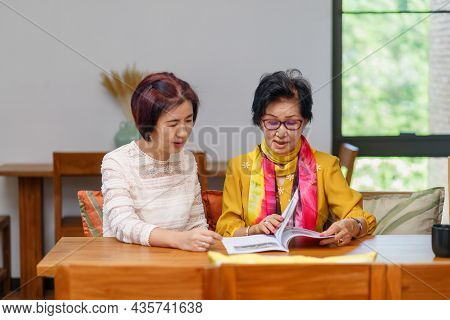 Asian Middle Aged Daugther Takecare Senior Mother At Home