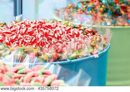 Candy Shop Window Showcase With Different Types Of Sweets. Big Box Of Fruit, Jelly, Caramel, Gummies