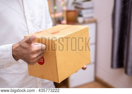 Asian Male Hand Writing Order Product List On Note For Online Customer In Warehouse Home Office Orde