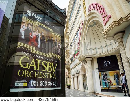 Baku, Azerbaijan - May 3, 2019: Ticaret Merkezi Shopping Mall Entrance With Advertising Board For Th