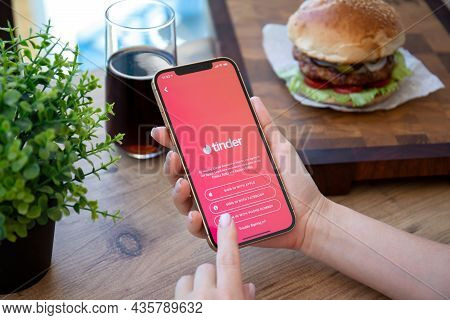 Alanya, Turkey - September 23, 2021: Woman Hands Holding Iphone 12 Pro Max Gold With Online Internet