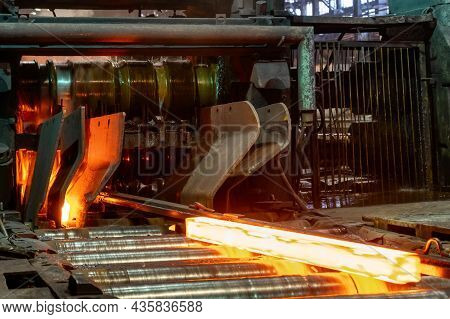 The Process Of Rolling Hot Rolled Steel In A Rolling Mill.