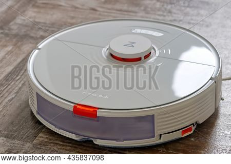 Tallinn, Estonia - October 10, 2021: Xiomi S7 Roborock Vacuum Cleaner Performs Automatic Cleaning Of
