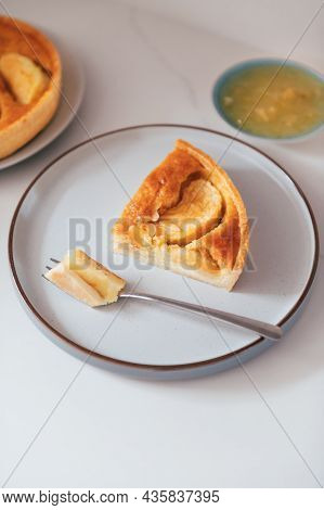 Shortcrust Pastry Case Filled With Bramley Apple Compote And Ground Almond Sponge, Topped With Braml