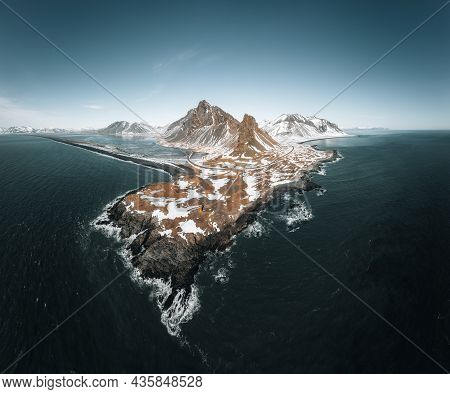 Drone View Of A Snow Covered Eystrahorn Mountain In Iceland At Hvalnes Peninsula