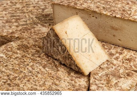 Food As A Background - Mounatin Cheese Named Tome