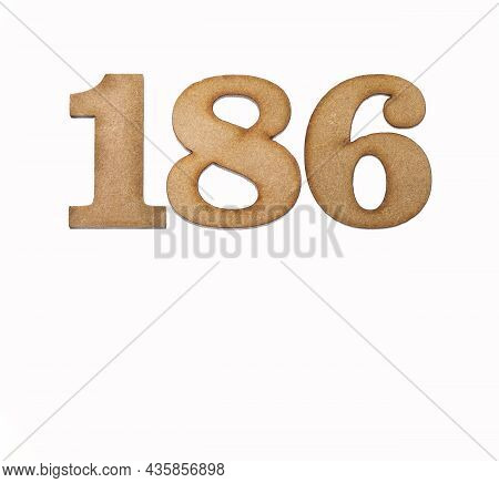 Number 186 In Wood, Isolated On White Background