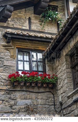 Facade of a medieval building in the center of Pamplona, ??medieval stone streets, typical and tourist alley of the city. Navarra Spain