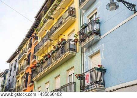 Colorful building facade in the old town of Pamplona, ??Navarra, Spain. Streets where San FermÃ­n is celebrated