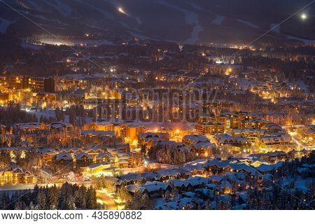 Breckenridge, Colorado, USA town skyline in winter at dusk.