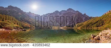 Tatra National Park, Poland. Panorama of mountains lake Morskie Oko Or Eye of the Sea In autumn. Beautiful Tatras Landscape.