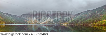 Tatra National Park, Poland. Panorama of mountains lake Morskie Oko Or Eye of the Sea In autumn. Beautiful Tatras Landscape.