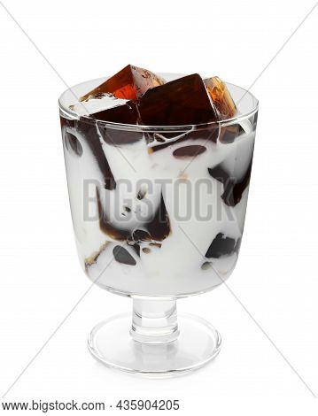 Glass Of Milk With Delicious Grass Jelly Isolated On White