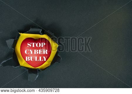 Layout Of Torn Paper And Heart Model With Text Stop Cyber Bully. Cyberbullying Concept