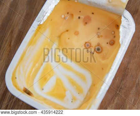 Spoiled Cheese With Mold And Mildew. Violation Of Food Storage Conditions, Shelf Life, Close-up