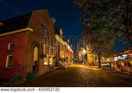 Medieval houses in the historical town Sneek in the Netherlands at night