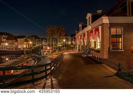 Medieval houses in the historical town Sneek in the Netherlands at night