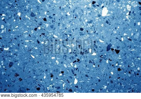 Cement Plate With Small Gravel Stones In Navy Blue Tone. Abstract Background And Texture For Design.