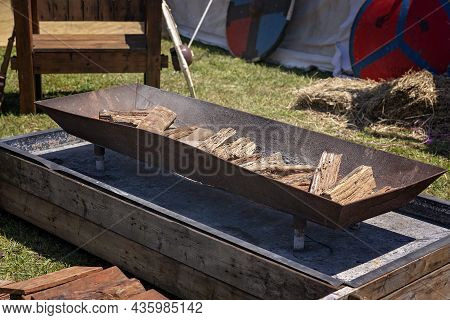 A Wood Fired Barbecue For Cooking Food In A Re-enactment At A Country Village Fair