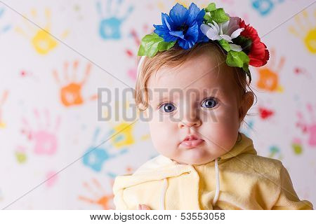 Cute Little Baby With Flowers